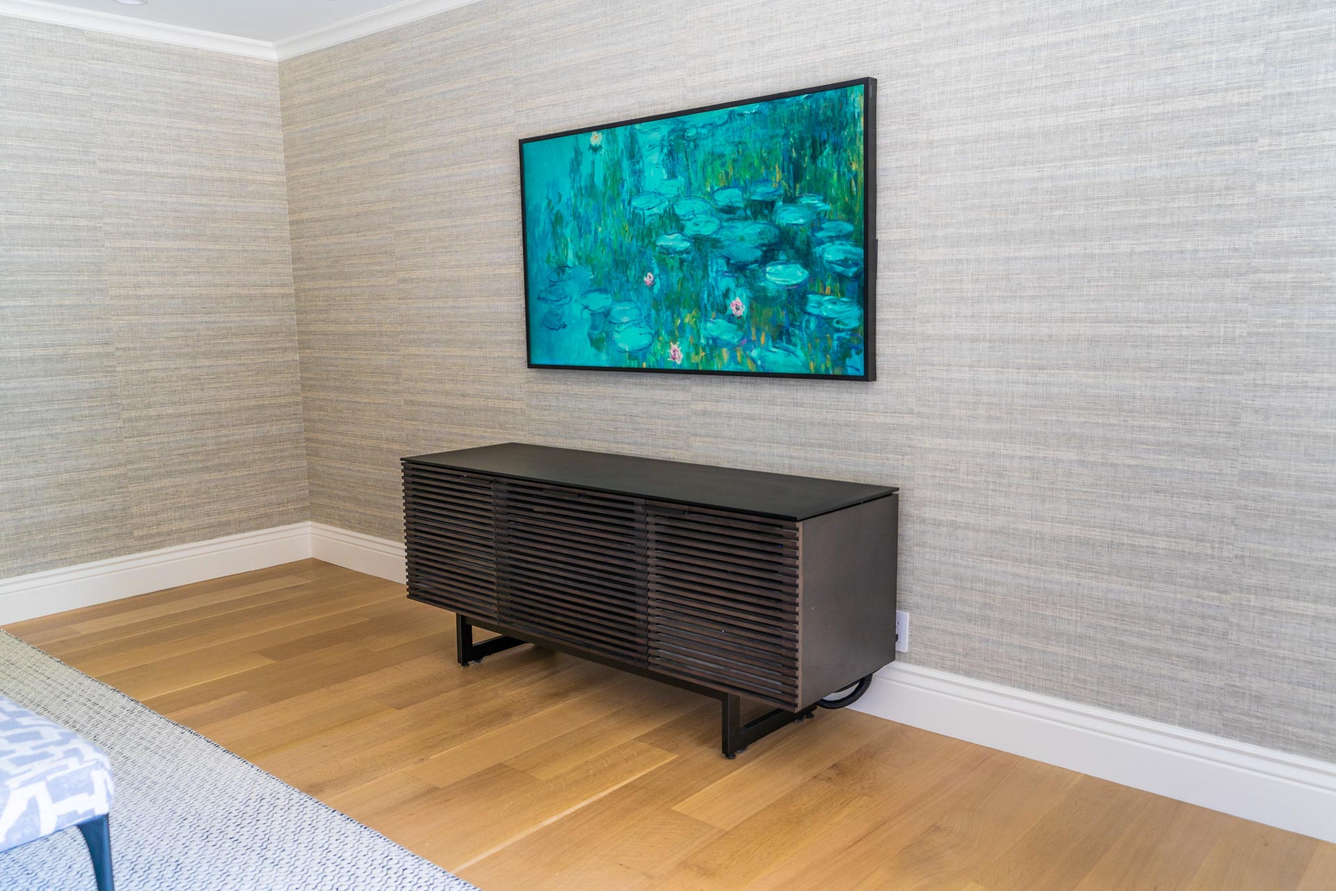 Frame TV hiding in plain sight in the master bedroom – SoundVision 65" Frame TV in the master bedroom with ceiling mounted Bowers and Wilkins 8" high performance speakers
