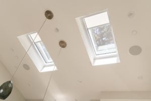 Lutron motorized shades to cover skylights.