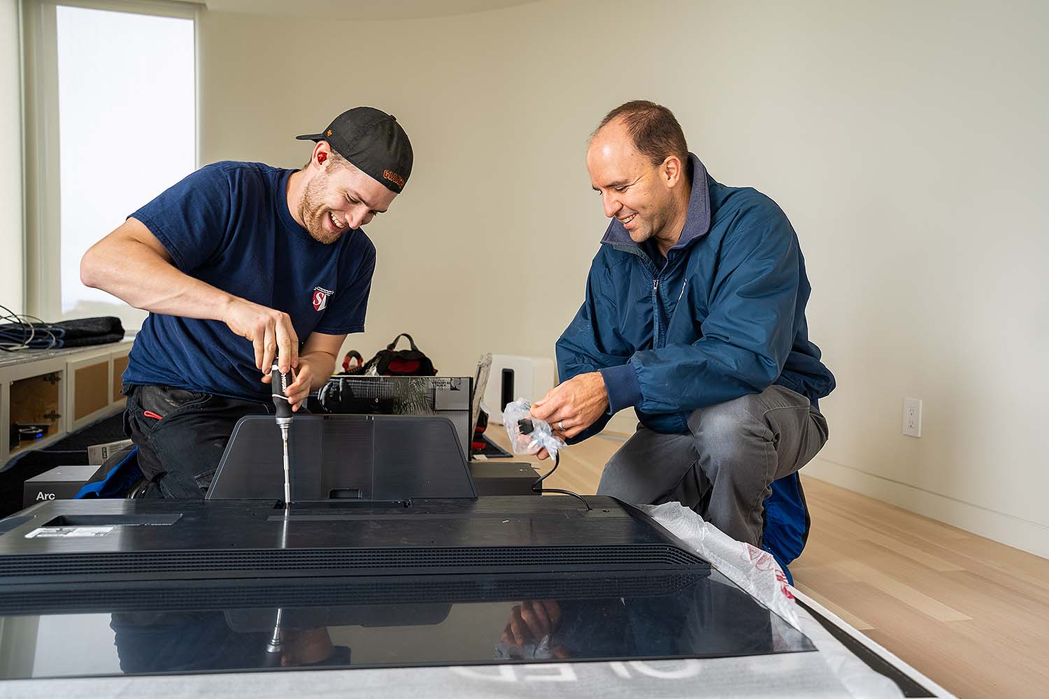 SoundVision Technician and project manager working on a TV